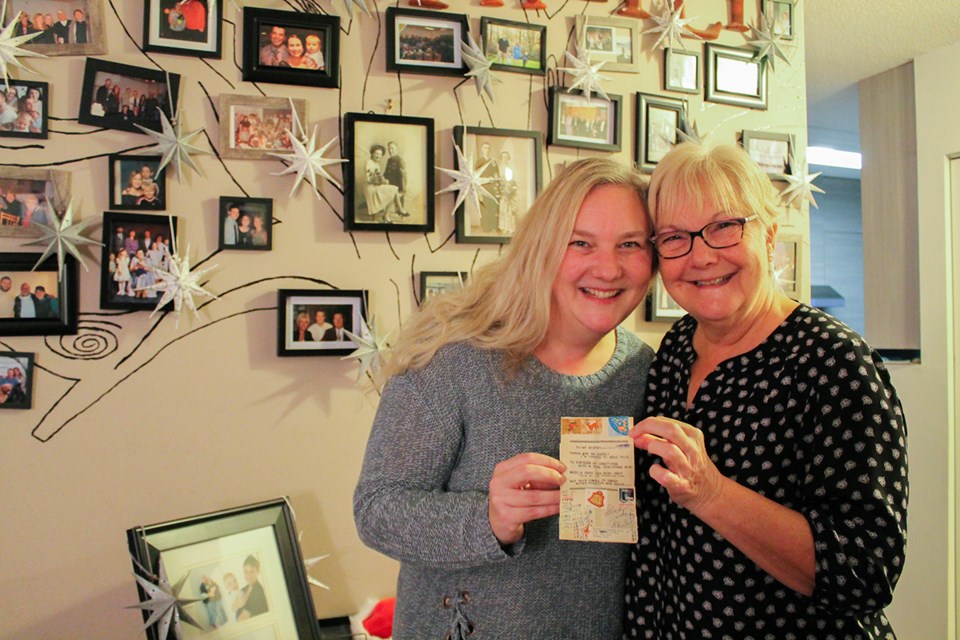 Tara Dewerson (left) and her mother, Sandra Sheppard (right), are happy to see their family tradition going on strong for 57 years.