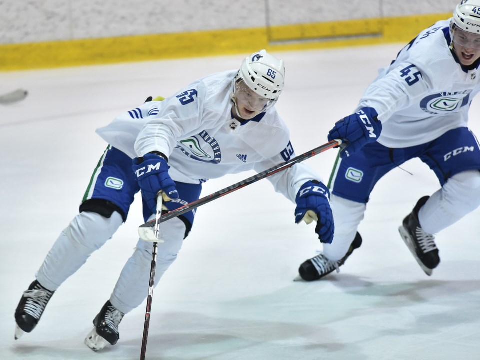 Toni Utunen protects the puck at the Canucks 2019 prospect development camp.