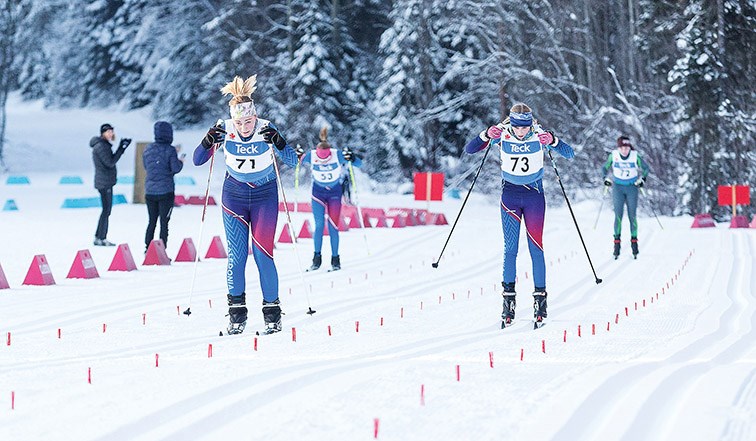 Payton Sinclair, left, and Iona Cadell give it their all just before crossing the finish line on Sunday morning at Otway Nordic Centre while competing in the U14 Girls division last winter in the Teck Northern Cup #2 and B.C. Winter Games Zone 8 trials. The host Caledonia Nordic Ski Club is hosting its annual ski swap on Saturday at its trail facility off Otway Road.