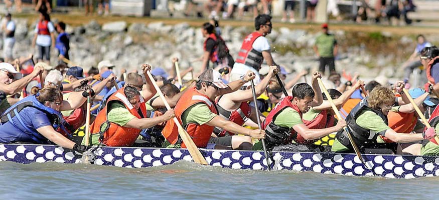 Dragons raged along Steveston Harbour in the 3rd Annual Steveston Dragon Boat Festival on Saturday. Almost 3,500 paddlers came to challenger each other and nearly twice as many spectators from Anchorage to New Orleans came out to watch the spectacle.