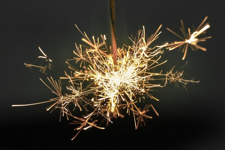 Sparkler against a black backdrop