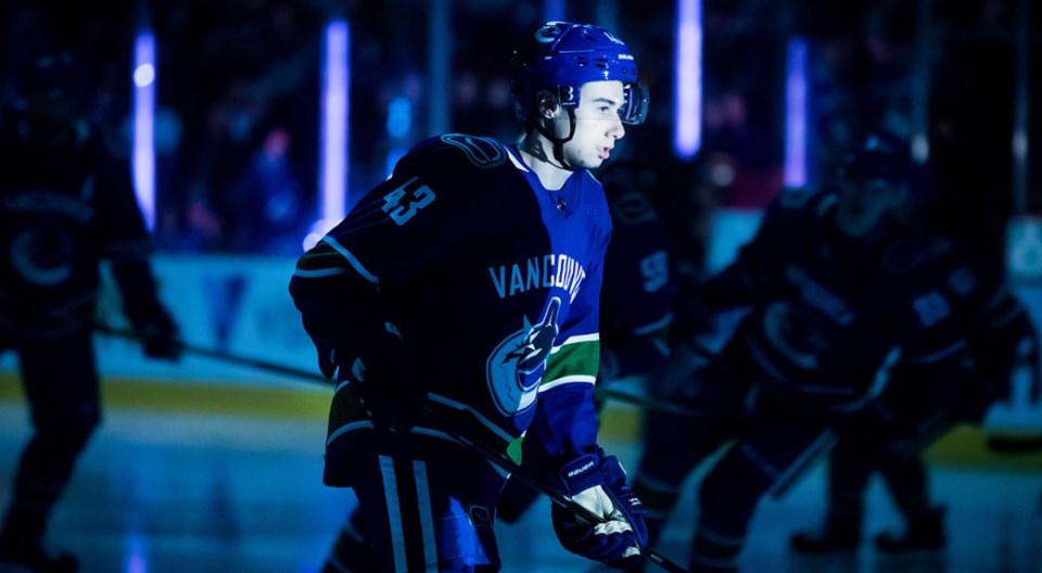 Quinn Hughes in the spotlight for the Vancouver Canucks.