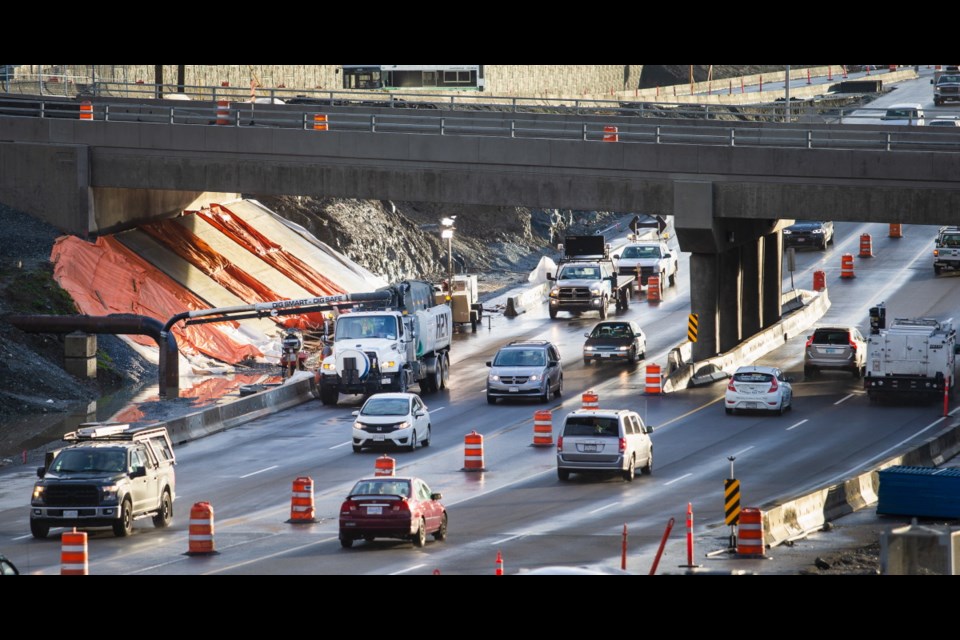 Part of the Trans-Canada Highway underpass at the McKenzie interchange had to be briefly closed on Tuesday because of flooding from heavy rain. The project's drainage system has not been completed yet.