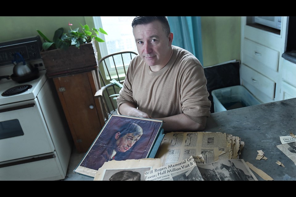 Carl Baird found this book of Will Rogers’ memorabilia two years ago and doesn’t know what to do with it. Photo Dan Toulgoet