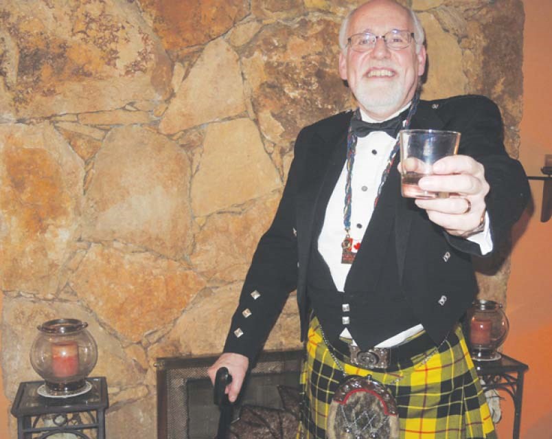 Ian MacLeod toasts Robert Burns. Richmondite MacLeod is proud of his Scottish roots and is encouraging others to join the "clan." File photo