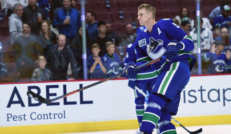 Tyler Myers warms up with the Vancouver Canucks