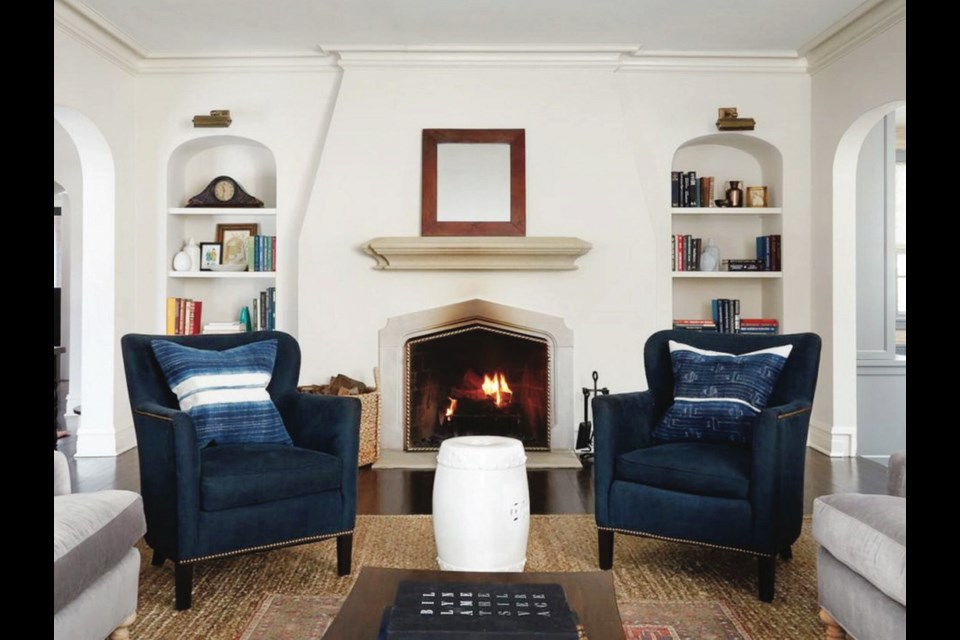 Create a striking shape around the fireplace with stucco walls and arches.