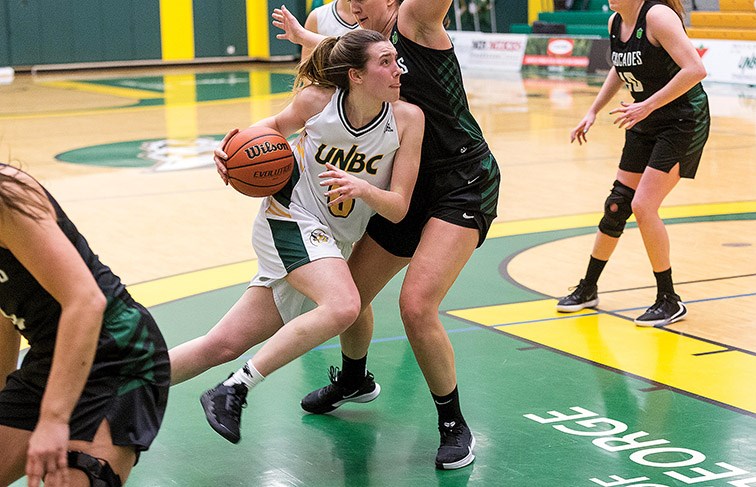 UNBC Timberwolves forward Madison Landry drives to the net against a University of the Fraser Valley Cascades defender during a game last season at the Northern Sport Centre. Landry is an U Sports Academic All-Canadian for the fourth straight season.
