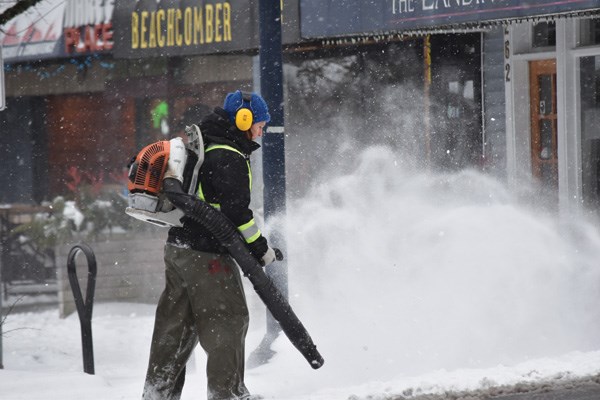 Town of Gibsons staff work to clear the snow from the streets of Lower Gibsons.