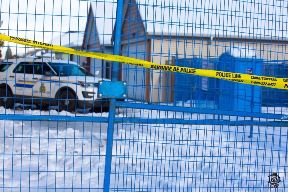 Police guard the property on No. 1 Road that was at the centre of Tuesday's fire. Photos submitted by Christian Yau