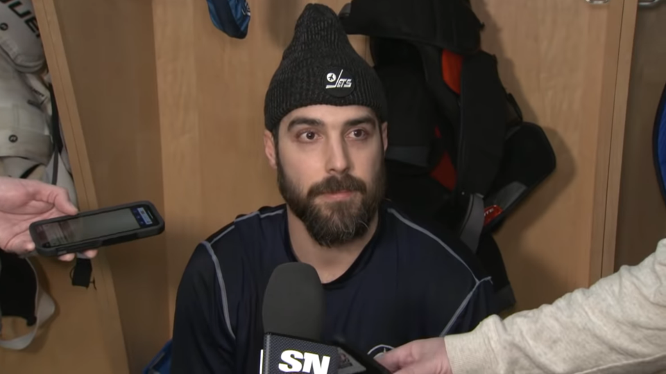 Mathieu Perreault speaks to reporters on Thursday in Winnipeg.