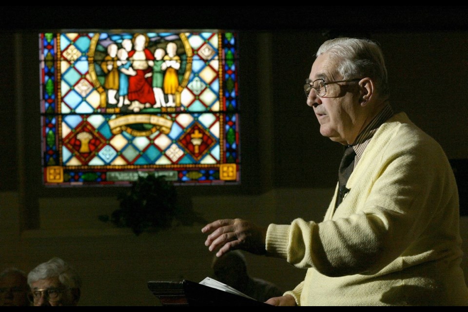 Ted Hughes speaking at St. Andrew's Presbyterian Church about initiatives to settle residential school abuse claims, on March 3, 2004.