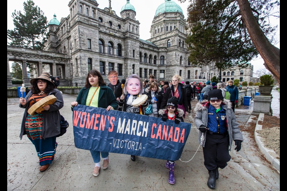 The Women's March Canada makes its way from the legislature to Centennial Square on Saturday.