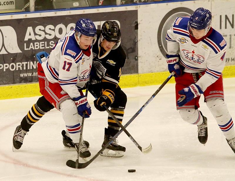 MARIO BARTEL/THE TRI-CITY NEWS
Coquitlam Express forward Massimo Rizzo is squeezed off the puck by Prince George Spruce Kings defenders Nolan Welsh and Mason Waite in the second period of their BC Hockey League game, Wednesday afternoon at the Poirier Sport and Leisure Complex. Prince George won, 4-2.