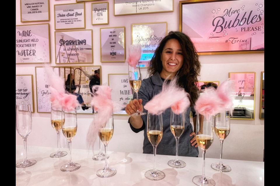 At Trius Winery, tour guide Jasmin Oskur prepares the showstopping final drink on a four-drink tour. Photo Jennifer Bain