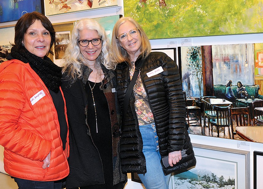 North Vancouver Community Arts Council executive director Nancy Cottingham-Powell flanked by exhibiting artists Lori Bagneres (left) and Kathy Daley.