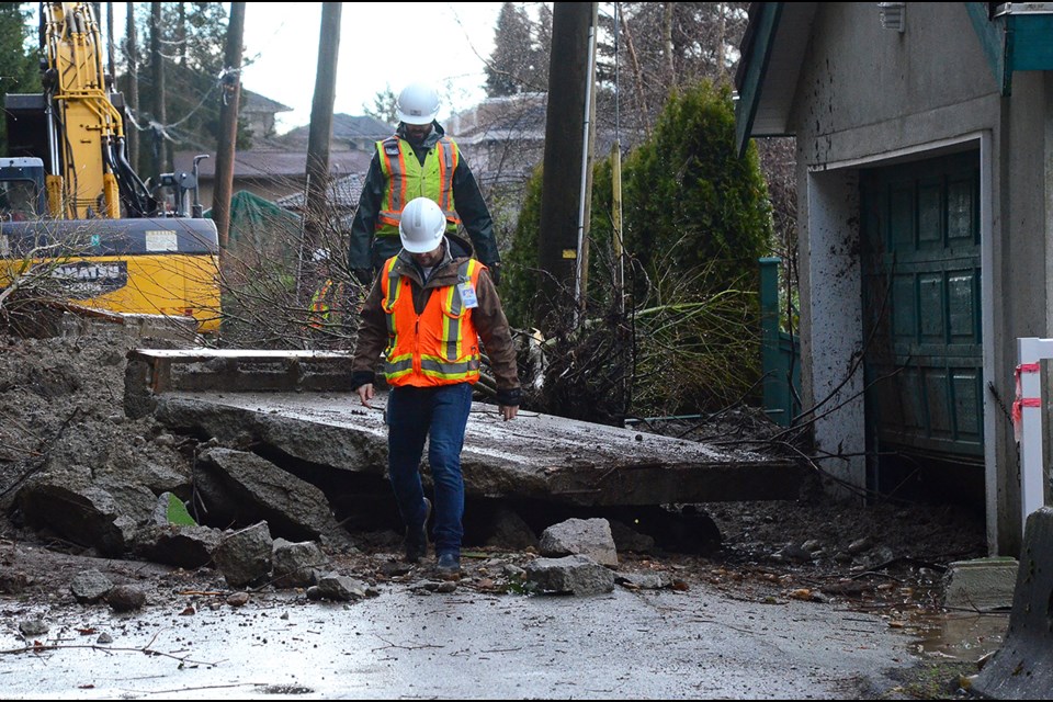 City crews have begun cleaning up a collapsed retaining wall that sent concrete slabs, mud and rocks onto a lane between Barnet Road and Braeside Drive early this week.