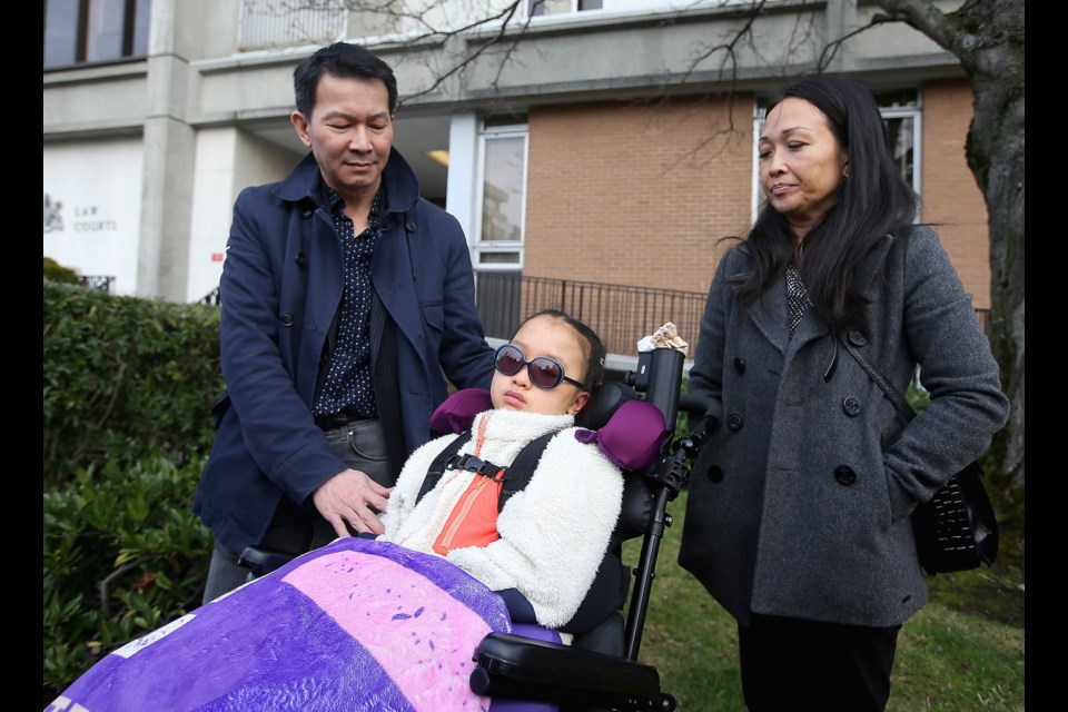 Parents Tuan Bui and Kairry Nguyen with their daughter Leila Bui address the media after Tenessa Nikirk (not in photo) was found guilty in the Stanch crash that left Leila with catastrophic injuries.