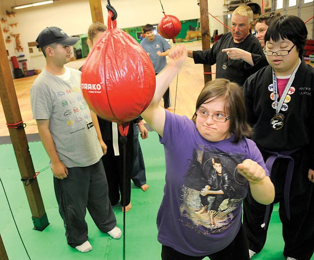 Melissa gets stuck into a punchbag.