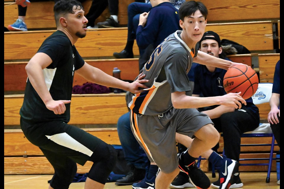 South Delta Grade 10 forward Connor Rerup drives to the basket during Tuesday night's South Fraser League encounter with Sullivan Heights in Tsawwassen.
