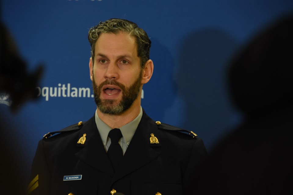 Coquitlam RCMP spokesperson Cpl. Michael McLaughlin speaks at a press conference following the annou