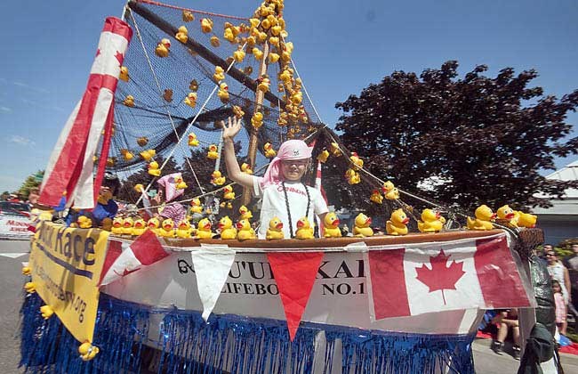 An estimated 80,000 people flooded Steveston's streets throughout the day for the 68th Annual Steveston Salmon Festival, with another 8,000 attending the Ships to Shore Festival along the village's waterways. Revellers enjoyed the parade, the salmon barbeque and the 14 old ships docked at Britannia Heritage Shipyard.