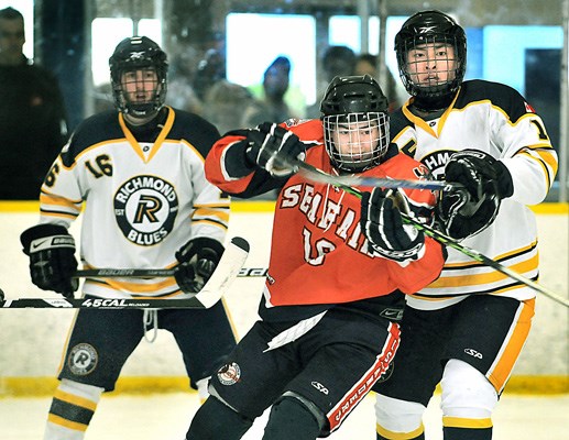 Lulu Island minor hockey rivals Richmond and Seafair clashed in the gold medal game at the B.C. Juvenile Championships at Minoru Arena. The Richmond Blues broke a 1-1 tie with a pair of goals in the final period to capture their third consecutive B.C. title, twice coming at the expense of their crosstown rival.