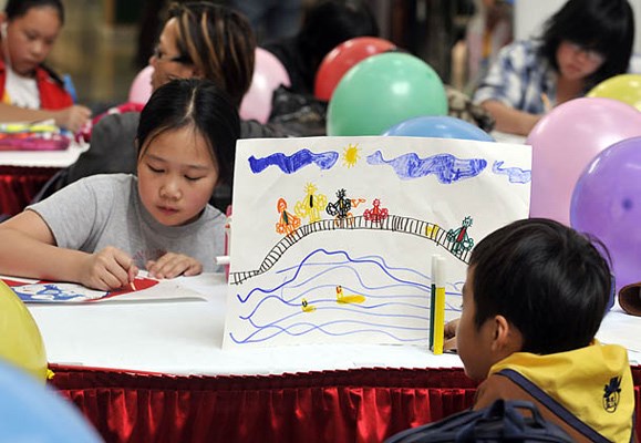 Richmond Chinese Community Society's 7th Annul Children's Drawing Contest at Lansdowne Centre. More than 200 young artists worked on this year's theme, "One World, One Home, One Heart." This year's winners in the Junior Group (12 and under) are: 1st place Paulina Tan; 2nd place Sky Huang; and 3rd place Tina Huang. Youth Group (12 to 17) winners are: 1st place Christy Lui; 2nd place Cindy Wu; and 3rd place Judy Wu.