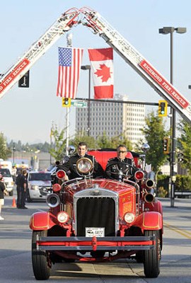 Dozens of first responder vehicles and hundreds of bikers mustered at River Rock Resort for the long cavalcade to Peace Arch Park for the 10th anniversary of the 9/11 tragedy. Vintage vehicles like this one from the New Westminster Fire Department went along for the ride.