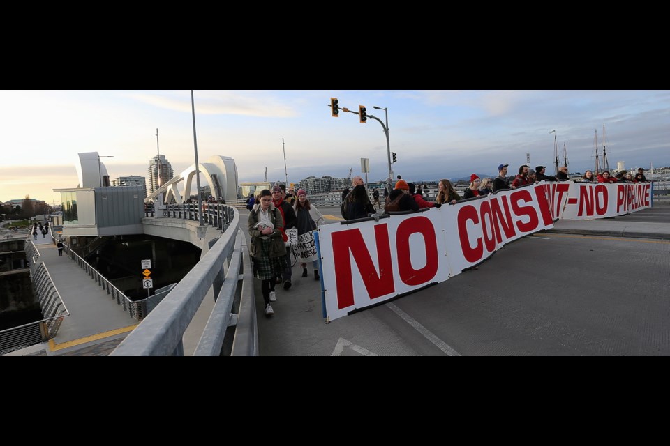 Hundreds of protesters shut both the Johnson Street and Bay Street bridges to vehicle traffic Monday evening.