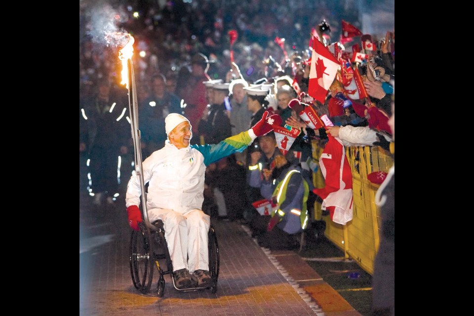 The memorable night Richmond's Man in Motion Rick Hansen, as the city's final torchbearer, carried the Olympic Flame into the O Zone at Minoru Park. Richmond News file photos
