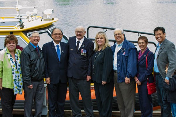 MLA Linda Reid, (left to right) Coun. Bill McNulty and MLA John Yap, Barry Hastings, MP Kerry-Lynne Findlay, Mayor Malcolm Brodie, Couns. Linda McPhail and Derek Dang were at the naming of the Auxiliary's new boat.