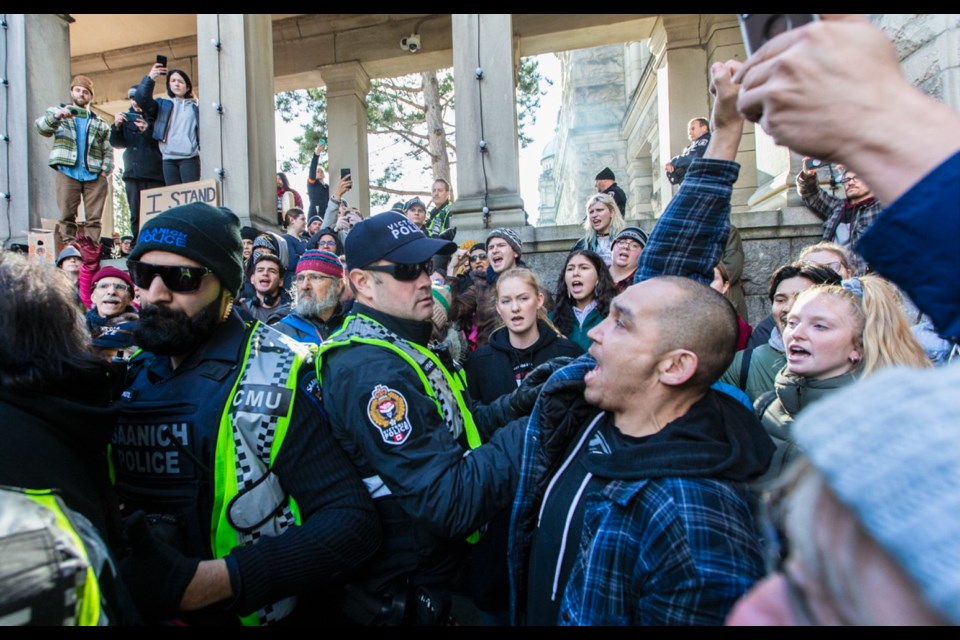 Supporters of the Wet'suwet'en hereditary chiefs blocked the entrances to the B.C. legislature on Tuesday, Feb. 11, 2020, ahead of the speech from the throne.