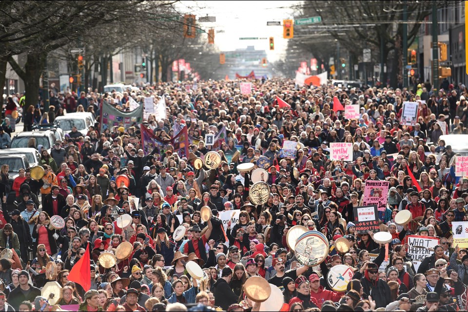 Thousands marched through Vancouver’s Downtown Eastside Friday, Feb. 14 for the annual Women’s Memorial March honouring the lives of missing and murdered women. Photo Dan Toulgoet