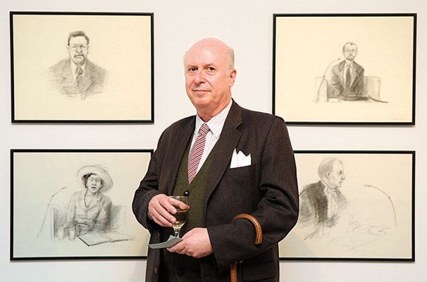 Neil Wedman stands in front of his courtroom sketches from the Fantasy Gardens trial of the early '90s.