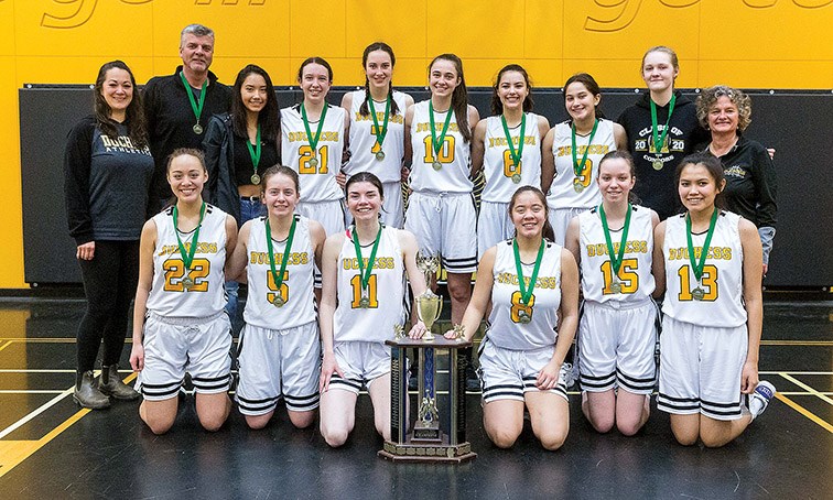 Citizen Photo by James Doyle. The Duchess Park Condors pose for a team photo as Zone Champions on Saturday afternoon at Duchess Park gymnasium after winning the final game of the 2020 North Central Zone AAA Girls Basketball Championships.