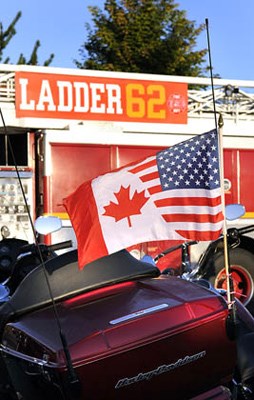 Remembering the tragedy of 9/11, convoy of motorcycles and first responder vehicles left River Rock Resort to meet up with others emergency services members from Canada and the US at Peace Arch Park.