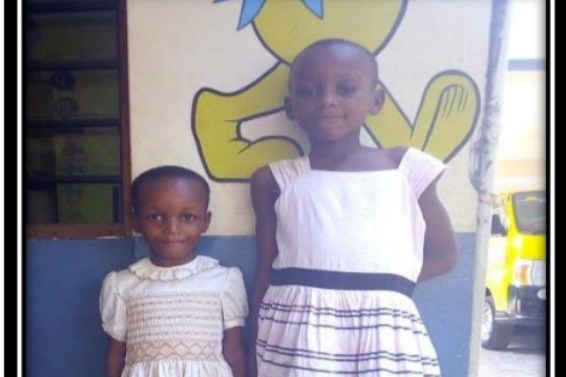 Selina and Ester Peters of Mombasa, Kenya. Their mother, Aisha, has struggled to pay for school tuit