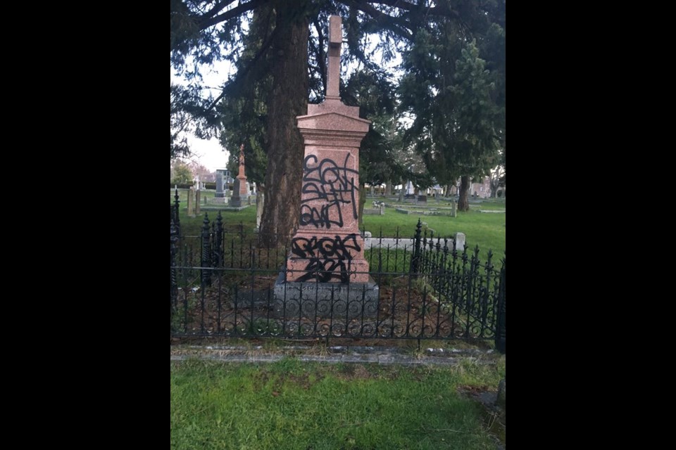 City of Victoria workers found Ross Bay cemetery’s Sir James Douglas monument, several trees and the main office smeared with illegible graffiti on Thursday morning. Feb. 20, 2020