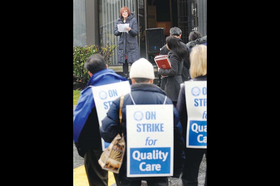 Developmental Disabilities Association strikes on Shell Road in Richmond. Director Alanna Hendren is in support of the striking community living workers.