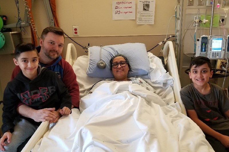 Coquitlam's Neeta Long in hospital with her family after surviving septic shock