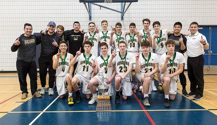 Citizen Photo by James Doyle. The Duchess Park Condors pose for a group photo after winning the 2020 North Central Zone AAA Boys basketball championship on Saturday evening at College Heights Secondary gymnasium.