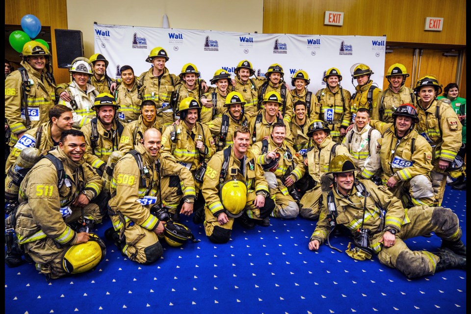 The Burnaby Fire Department's 2020 Climb for Tin Man team poses for a photo at the B.C. Lung Association’s Climb the Wall fundraiser in Vancouver Sunday.