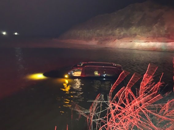 Vehicle in pond