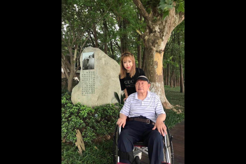 Melanie Huang and her 89-year-old grandfather in China.Photo submitted