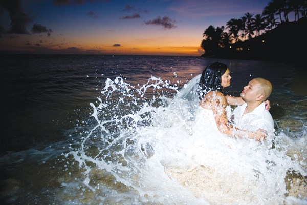 Jocelyn Urrutia and her husband, Ken, on their wedding day in Hawaii. The couple have been married for eight years with a baby son, Kennedy. To Urrutia, this picture captures "the beauty of Hawaii on one of the most memorable days of (their) lives."