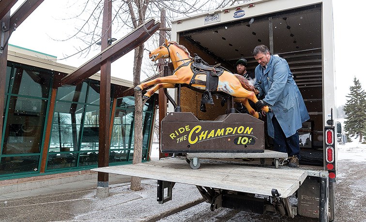 Champ is offloaded from a moving truck at The Exploration Place after being moved from the Northern on Tuesday morning.