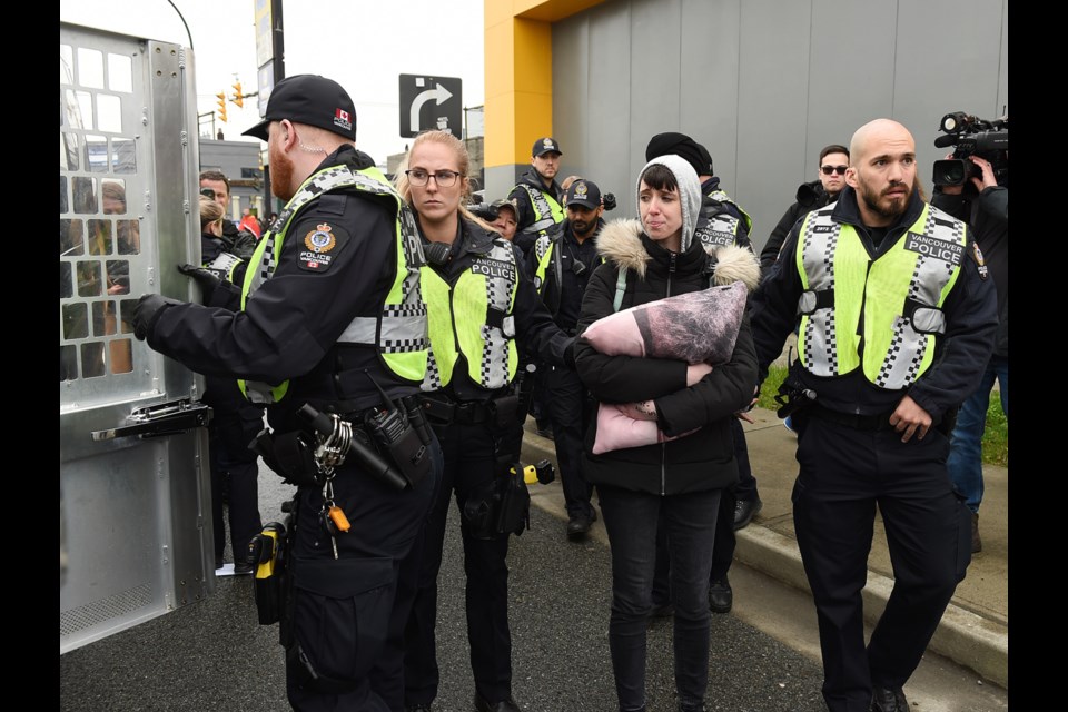 Amber Statters was one of several protesters arrested by Vancouver police Tuesday at the intersection of East Hastings and Clark Drive. Photo Dan Toulgoet
