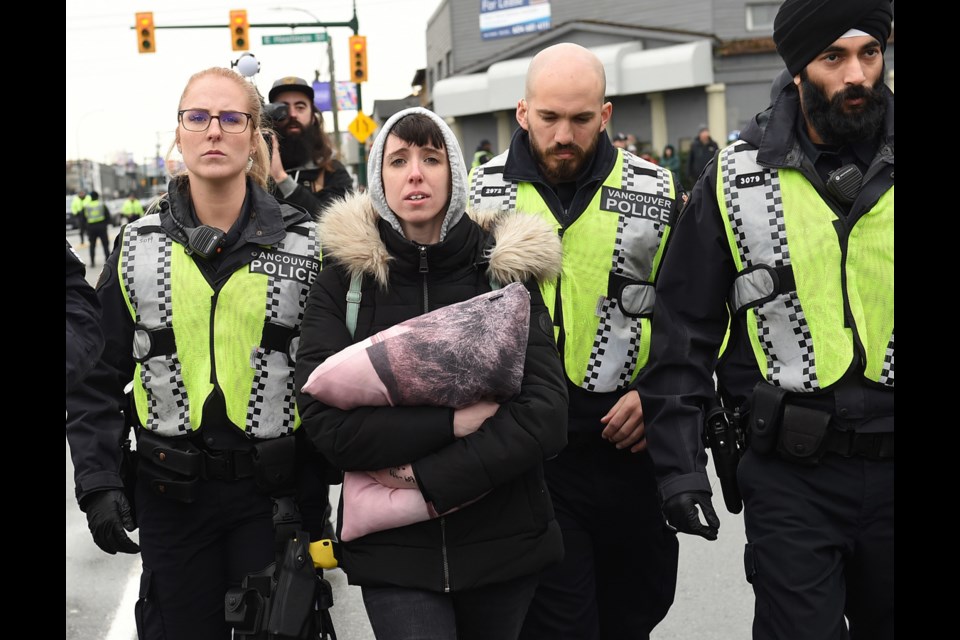 Amber Statters was one of several protesters arrested by Vancouver police Tuesday at the intersection of East Hastings and Clark Drive. Photo Dan Toulgoet