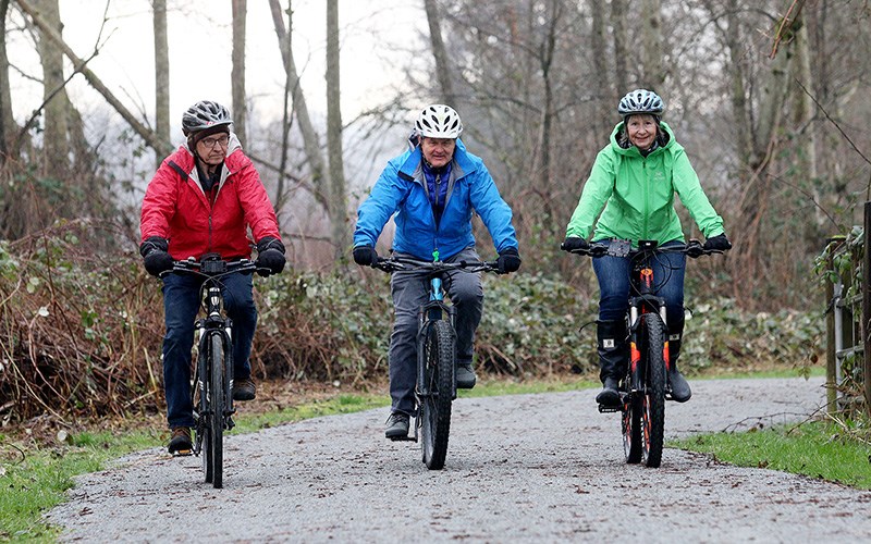 cyclists on the Sheeps Paddock trail in Coquitlam